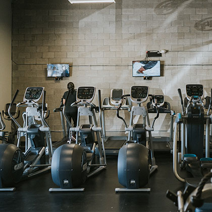 modern cardio machines with tv and headphone jacks
